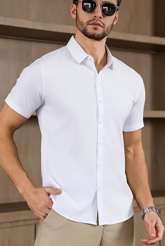 Men's business casual solid color short-sleeved shirt for summer, no ironing, comfortable, versatile top, white, worn by a male model.
