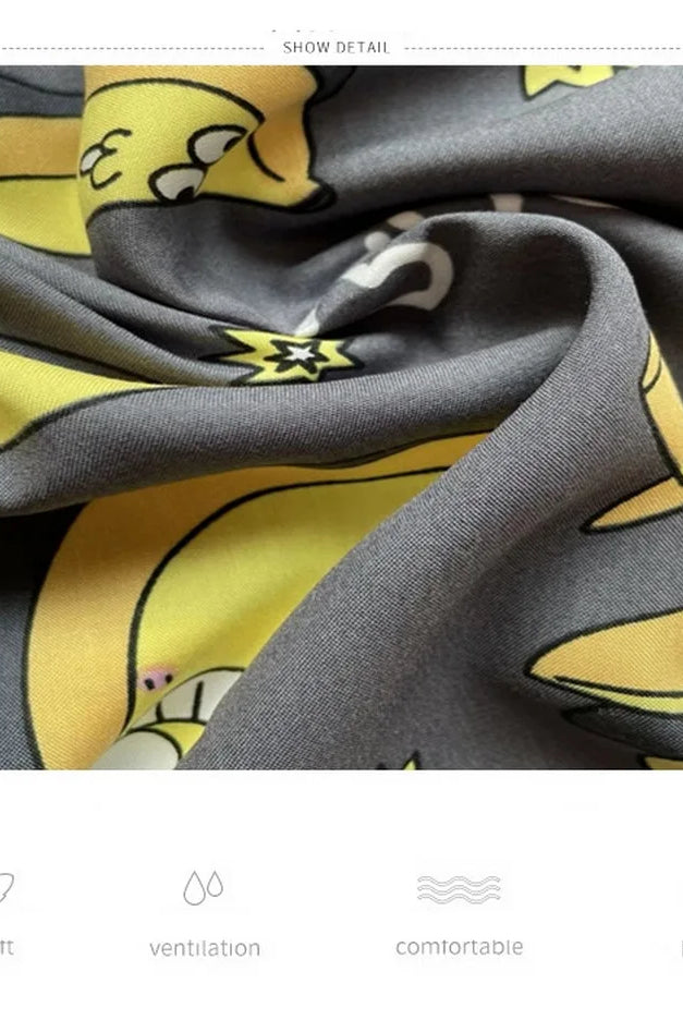 High-waisted wide-leg Capri pants for women with pockets, featuring a yellow and gray floral print, made of soft