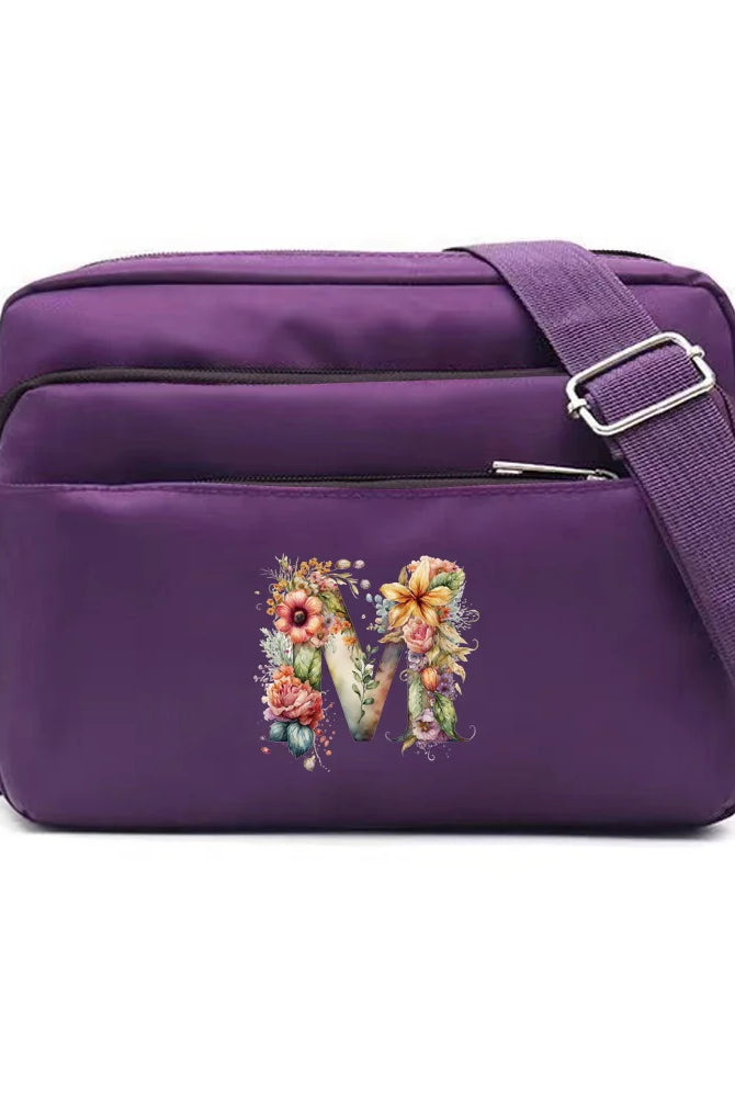 Leisure Purple One Shoulder Crossbody Bag with floral letter M design, large capacity, portable commuting storage bag.