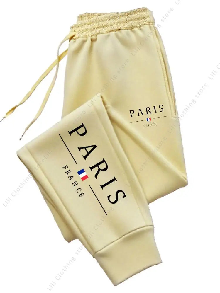 2025 New Hot Sale PARIS Jogger Pants for Women's Trousers in cream fleece material with Paris France branding and drawstring