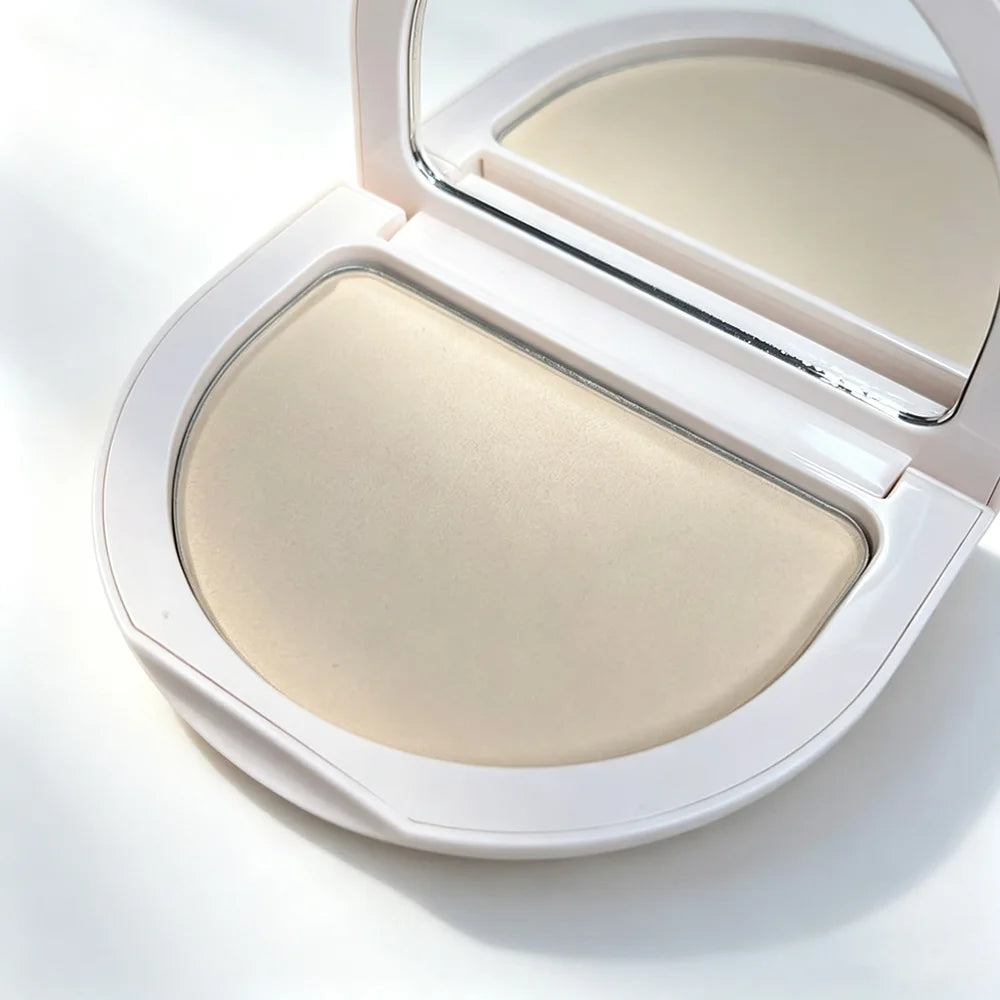 Rare Beauty Stay Genuine Shaded Compact Setting Powder in a white case with mirror, designed to softly set, mattify, and