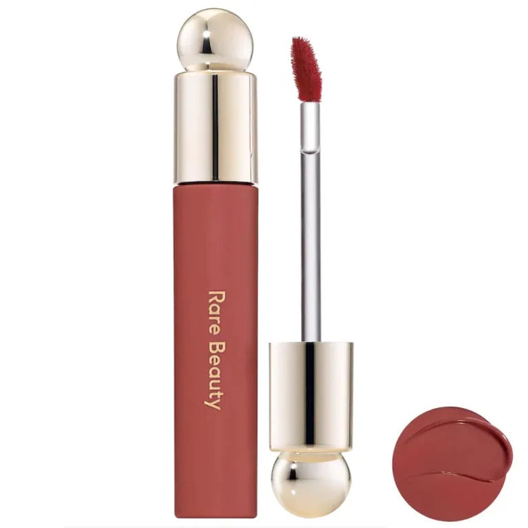 Rare Beauty 7-Colors Soft Pinch Tinted Lip Oil Stain Lip Gloss in natural pink with gold accents, applicator wand, and