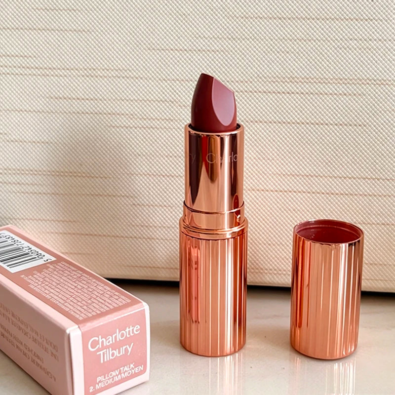 Charlotte Tilbury Walk of No Shame lipstick in graceful pink with matching Pillow Talk moisturizing plumping lip gloss in