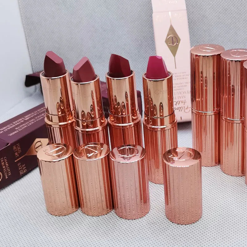 Charlotte Tilbury Makeup Lipstick set featuring Walk of No Shame, Graceful Pink, Pillow Talk shades and a strawberry vanilla
