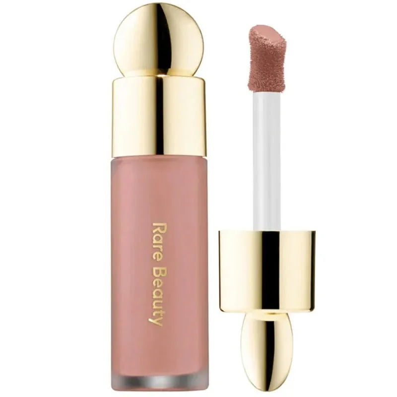 Rare Beauty Soft Pinch Liquid Blush in soft pink with a silky, smooth, long-lasting formula and applicator wand.
