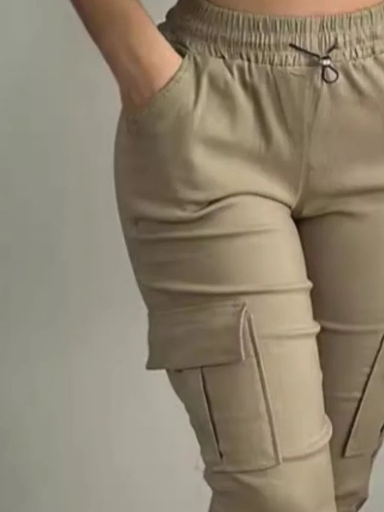 Summer Women's Slim-Fit Capri Trousers in solid beige with high waist, multiple pockets, lace-up detail, and tight leg fit.