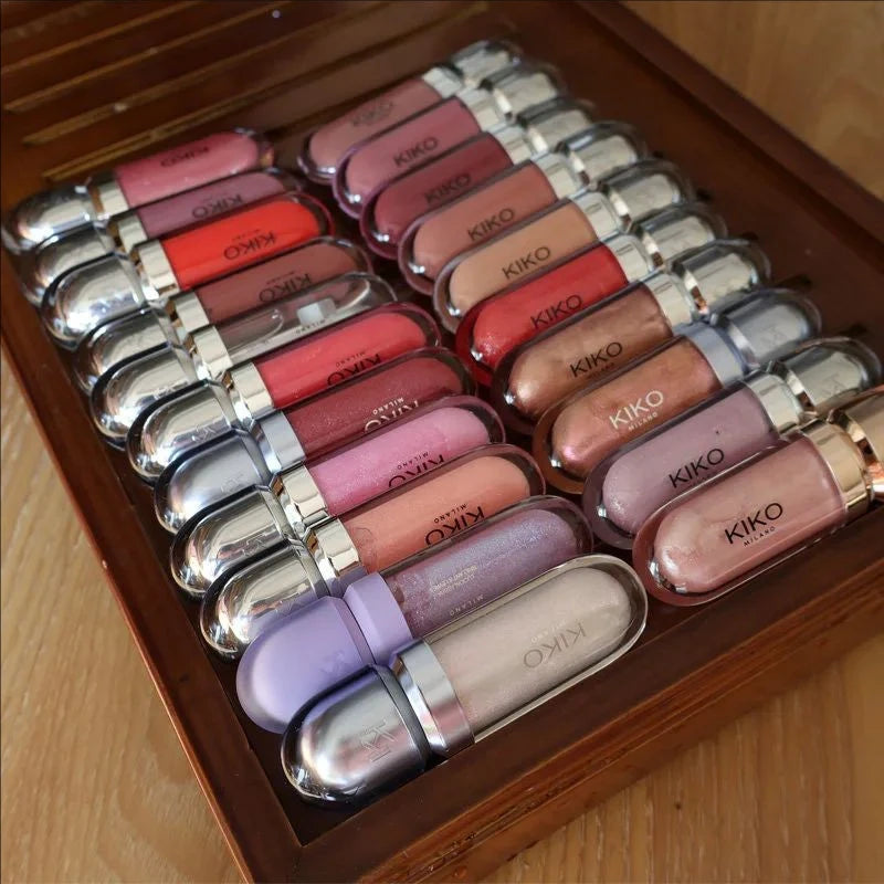 Fashion Kiko 3D Hydra Lip Gloss collection with colorfast, waterproof, long-lasting moisturizing shimmer shades in a wooden