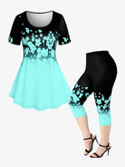 ROSEGAL Plus Size 3D Printed Outfit Female colorblock suit with floral graphic teal and black top and capri leggings