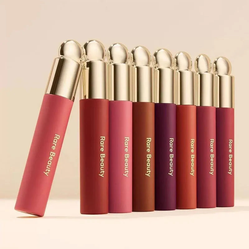 Rare Beauty 7-Colors Soft Pinch Tinted Lip Oil Stain Lip Gloss in pink, red, purple, and nude shades with gold caps