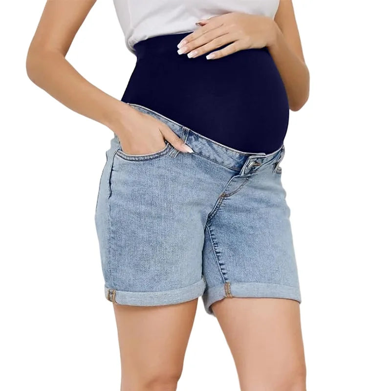 Pregnancy Capri Jeans High Waist Tummy Control Rolled Cuff Denim Shorts worn by a pregnant woman showing the high waist, rolled cuffs, and tummy control panel.