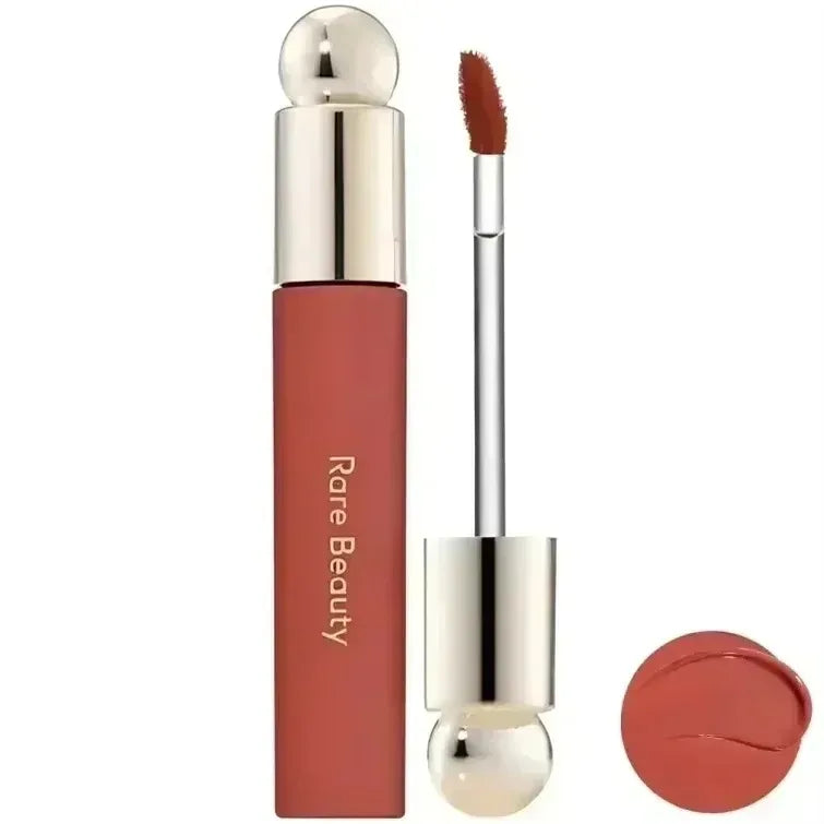 Rare Beauty 7-Colors Soft Pinch Tinted Lip Oil Stain Lip Gloss with a doe-foot applicator in shades Hope, Happy, Wonder, and