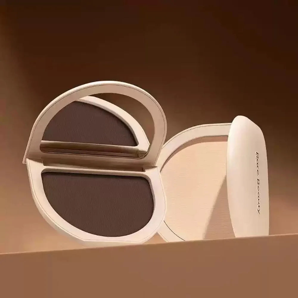 Rare Beauty Stay Genuine Shaded Compact Setting Powder with two brown shades in a light beige case for oil control and matte