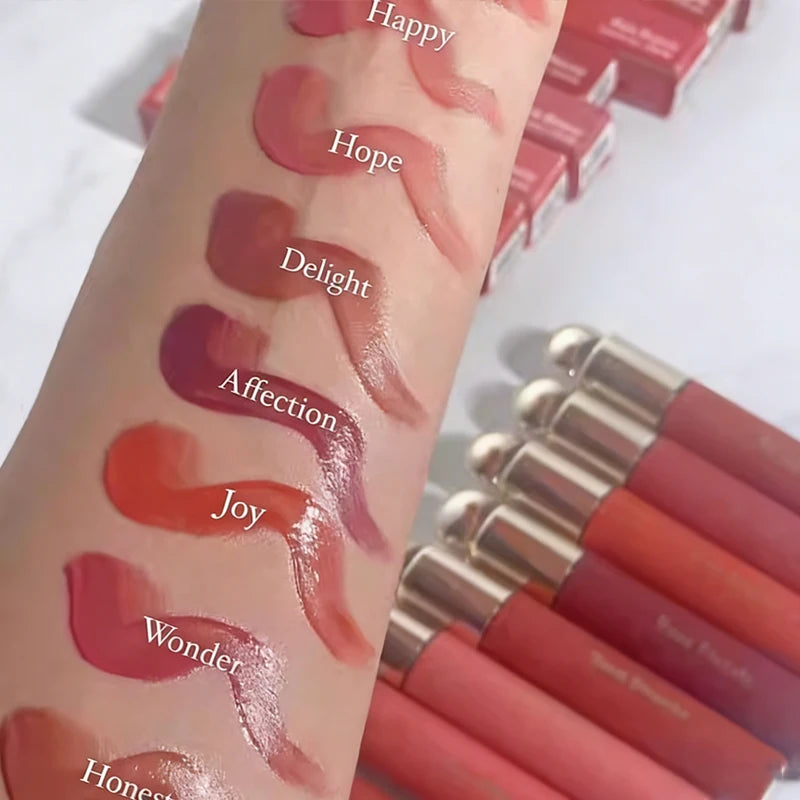 Swatch of Rare Beauty 7-Colors Soft Pinch Tinted Lip Oil Stain Lip Gloss in shades Happy, Hope, Delight, Affection, Joy