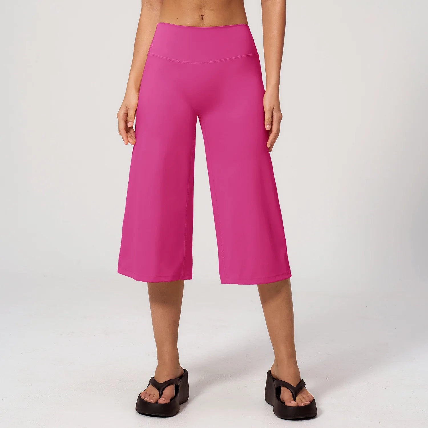 Summer Capri Pants for Women Wide Leg Yoga Cropped Pants Tummy Control High Waist in Flare Crop, buttery soft loose casual, pink, worn with black platform sandals.