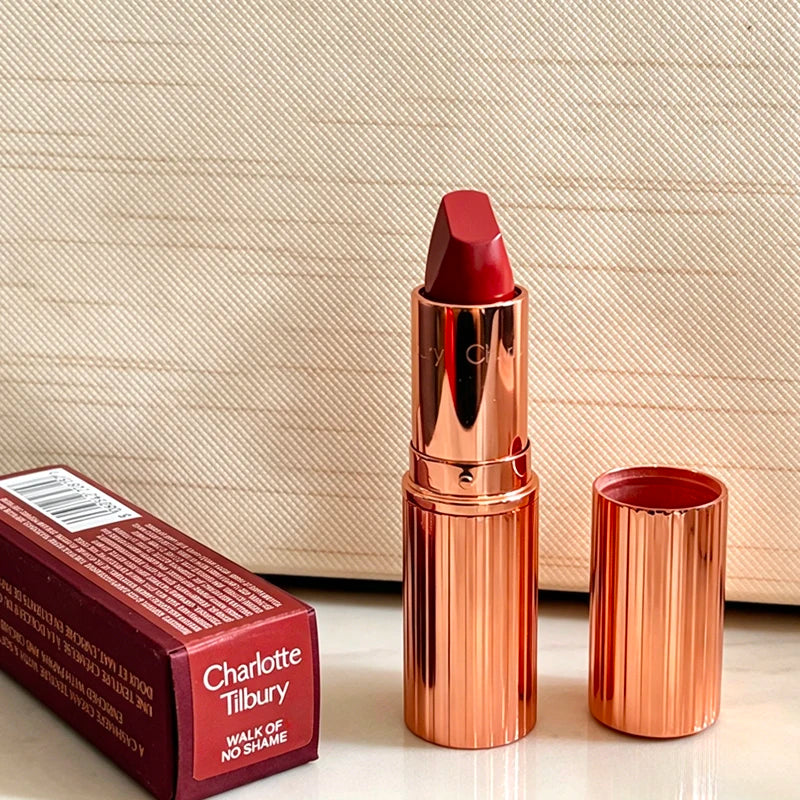 Charlotte Tilbury Walk of No Shame lipstick in graceful pink with matching moisturizing plumping lip gloss in strawberry