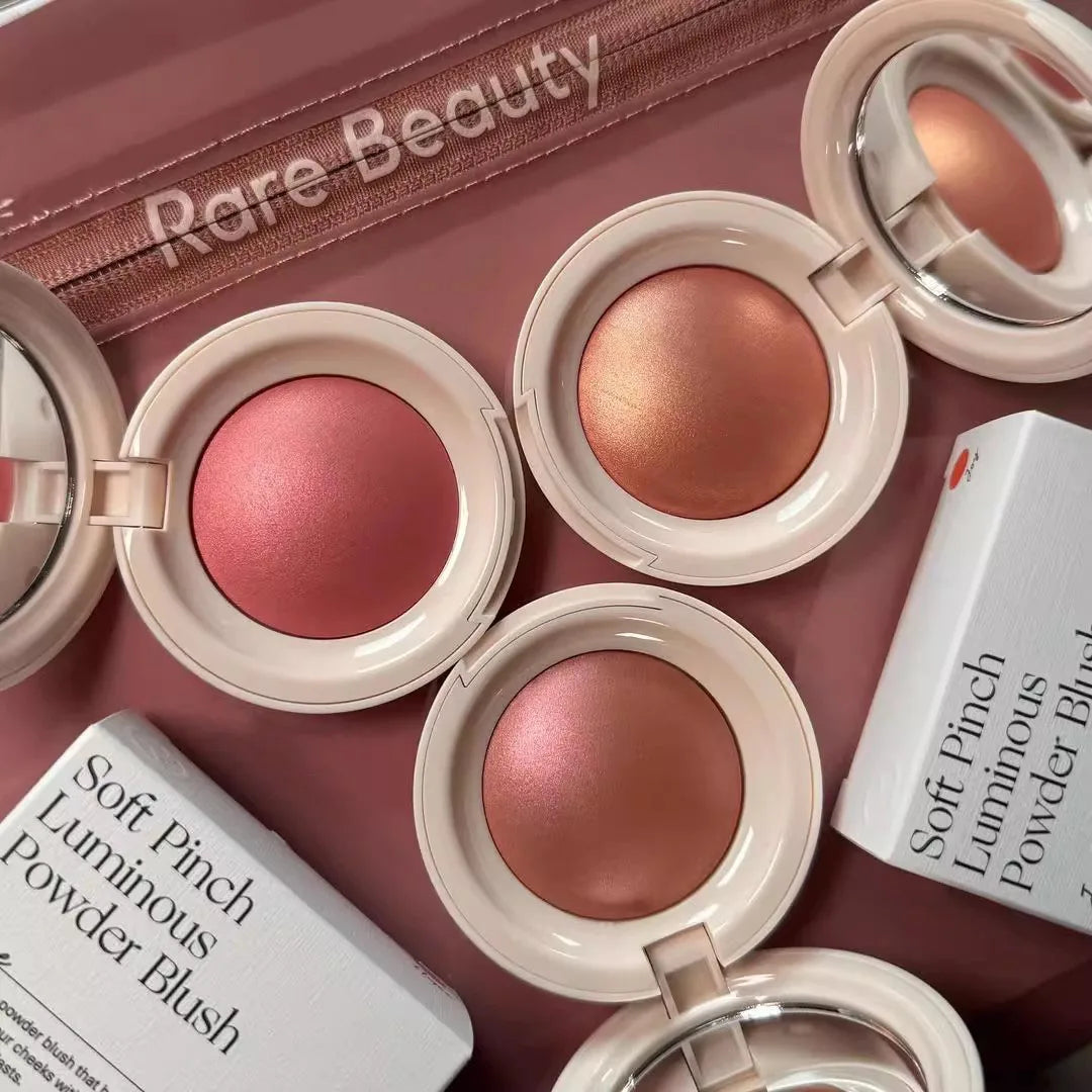 Rare Beauty Positive Light Powder Highlighter Blush Water Light Shimmer Waterproof Long Last Face Illuminator in pink and
