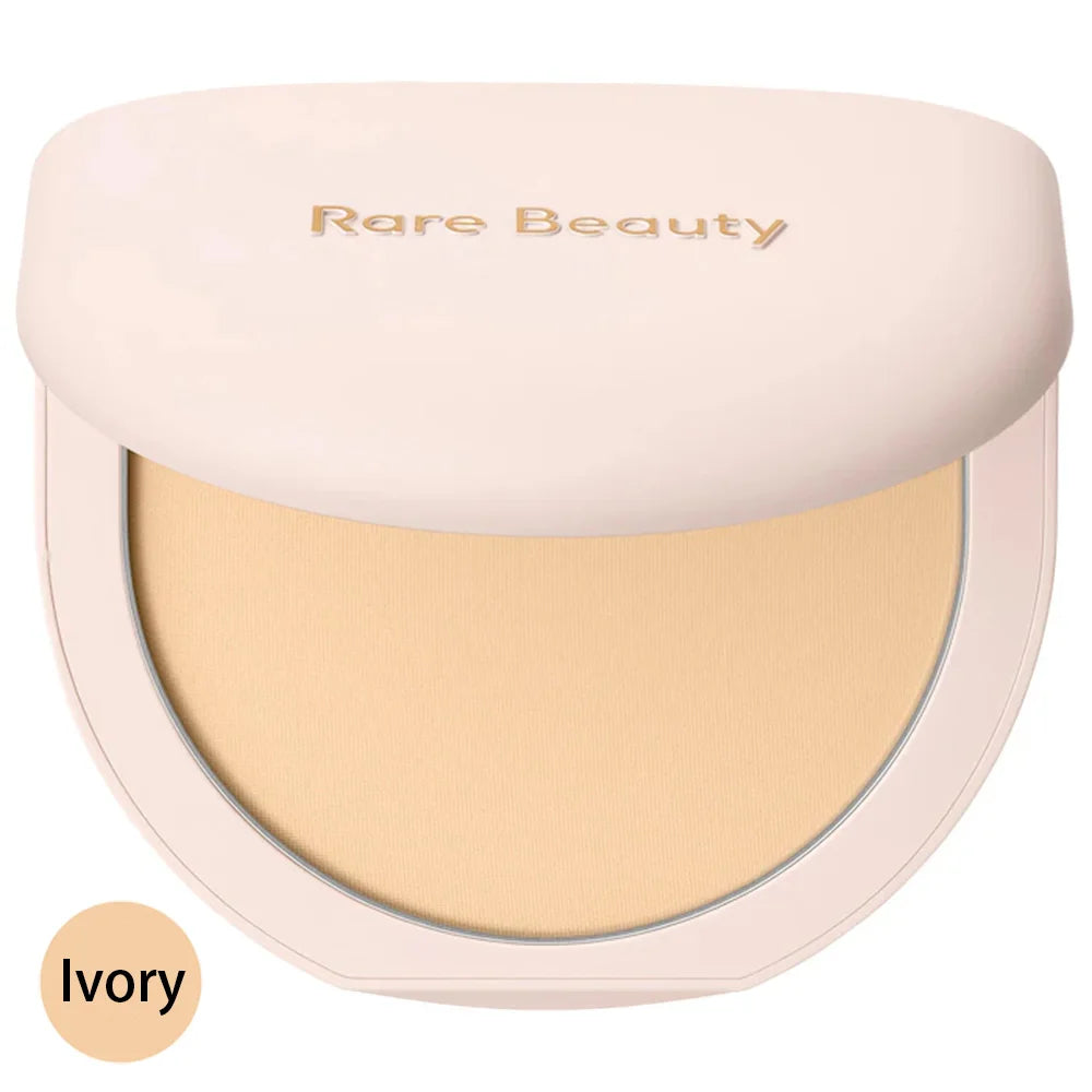 Rare Beauty Stay Genuine Shaded Compact Setting Powder in ivory with a smooth, light beige pressed powder inside a round