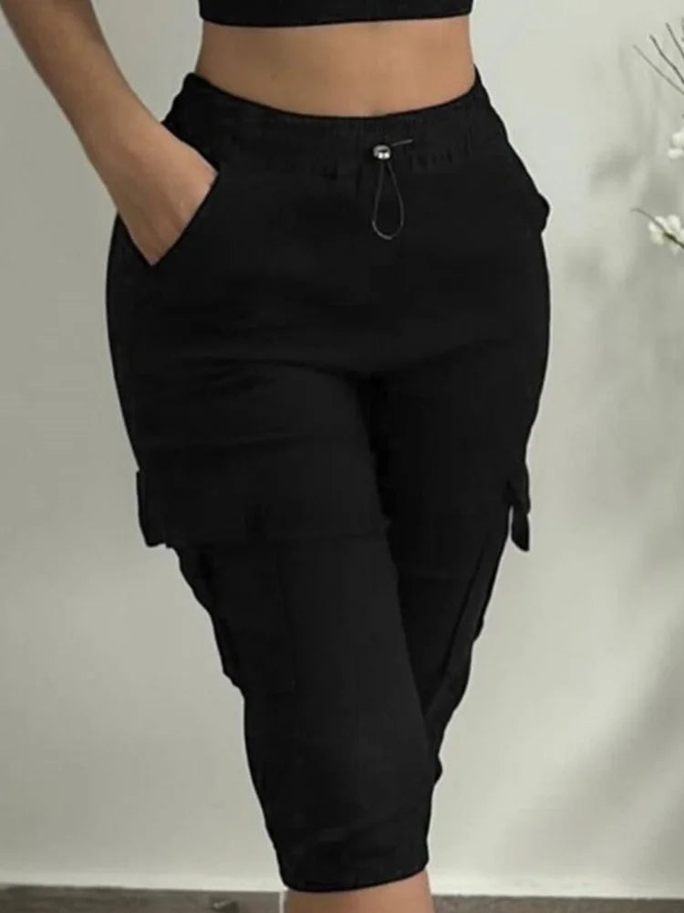 Summer women's slim-fit Capri trousers with high waist, multiple pockets, lace-up detail, solid color, casual tight leggings in black.