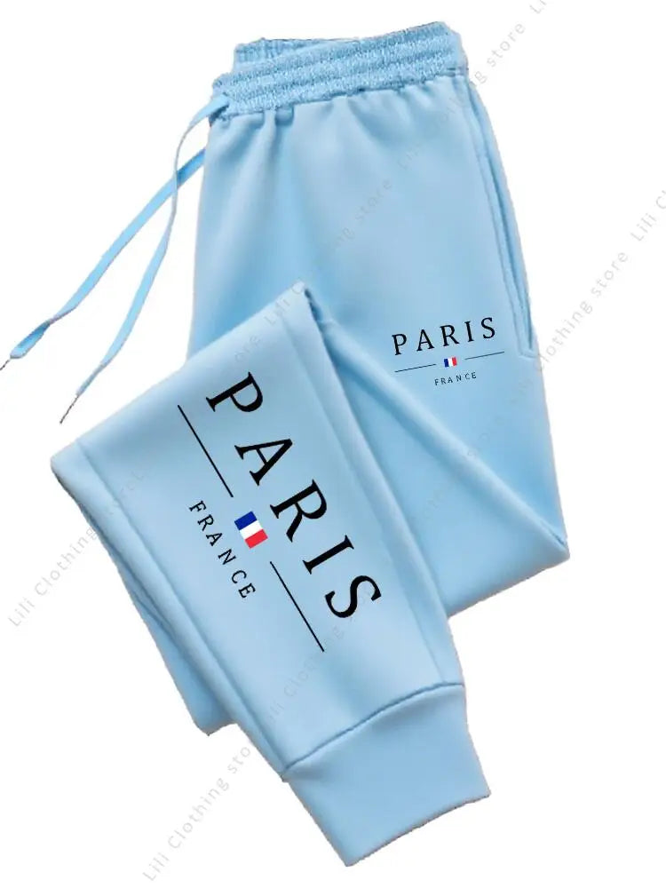 2025 New Hot Sale PARIS Jogger Pants for Women's high-quality fleece casual sports trousers in light blue with Paris and