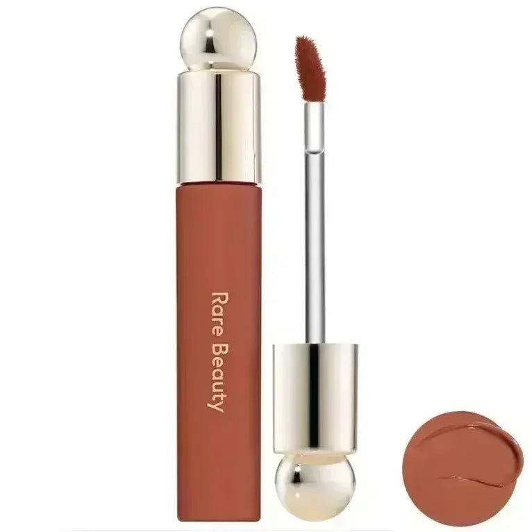 Rare Beauty 7-Colors Soft Pinch Tinted Lip Oil Stain Lip Gloss in natural brown shades with a silver and gold applicator and