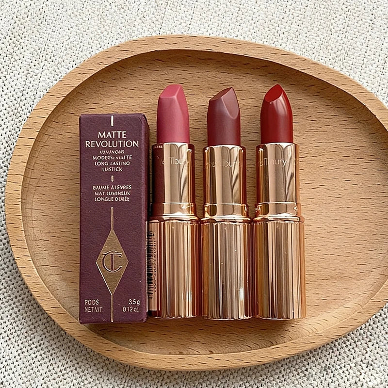Charlotte Tilbury lipstick and lip gloss set featuring Walk of No Shame, Graceful Pink, and Pillow Talk moisturizing